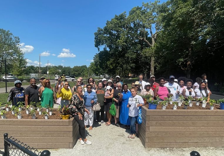 Group of police officers standing in front of their office building